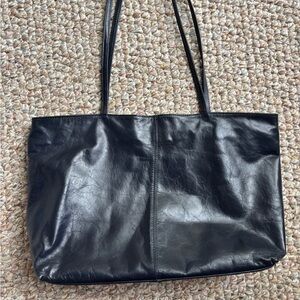 Latico - dark blue leather purse with a pretty floral inside material.